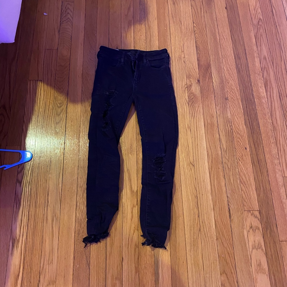 black ripped american eagle jeans